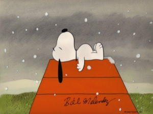 Snoopy laying on Dog House