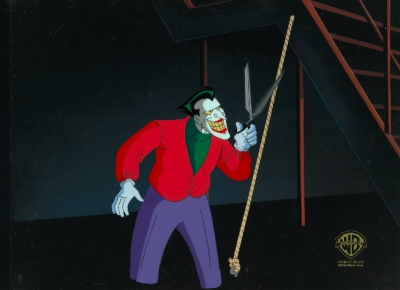 Joker holding scissors