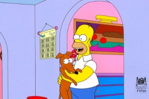 Homer Simpson holding Santa's Little Helper